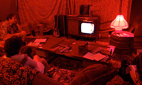 1960s period TV room bathed in red light