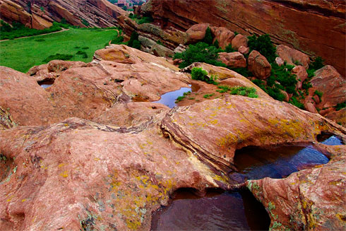 Clear pools of water in red sandstone
